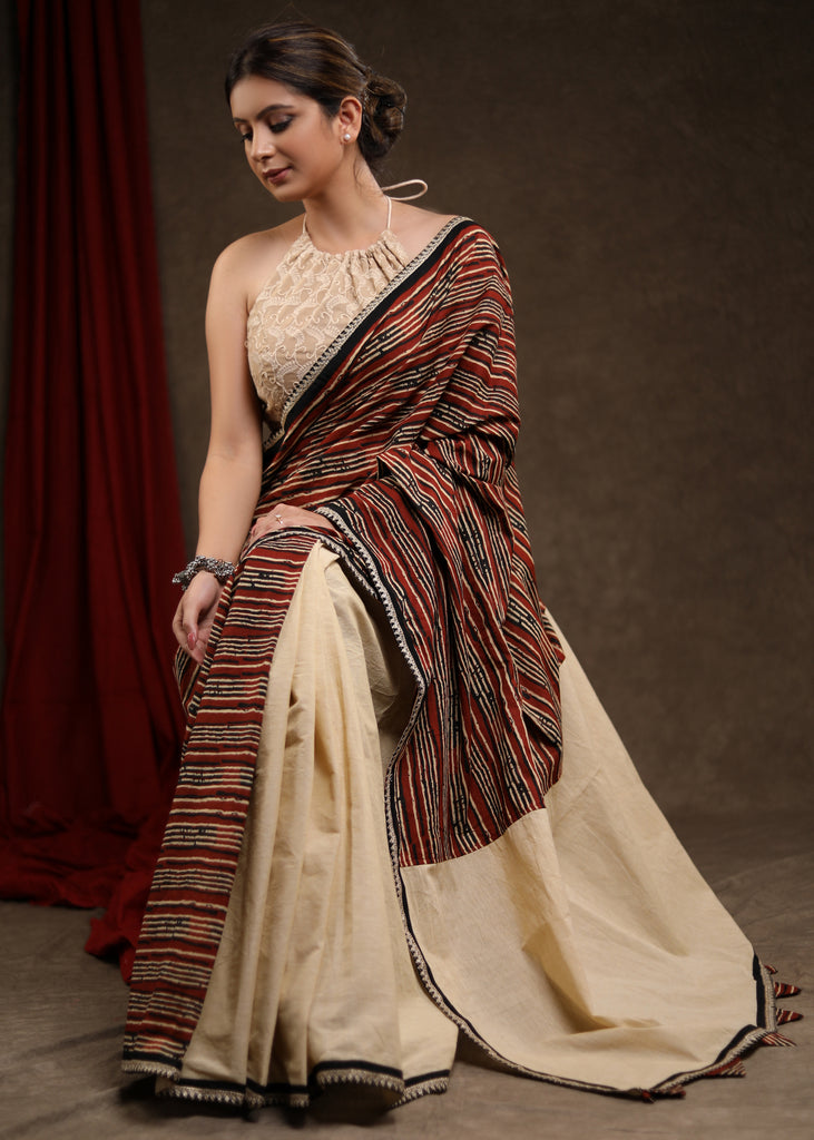 Charming Cream Cotton Half & Half Saree with Strip Combination Highlighted with Zari Border