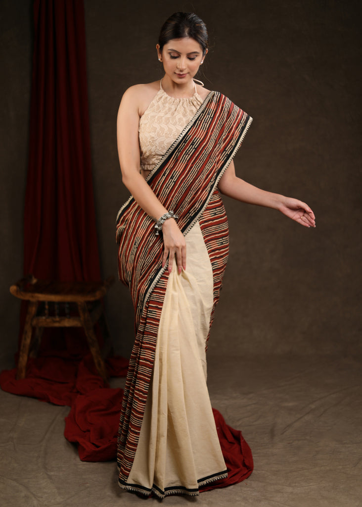Charming Cream Cotton Half & Half Saree with Strip Combination Highlighted with Zari Border