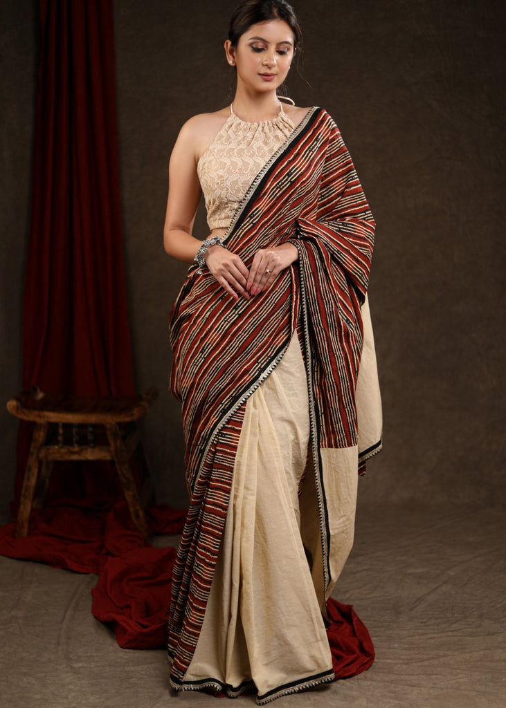 Charming Cream Cotton Half & Half Saree with Strip Combination Highlighted with Zari Border