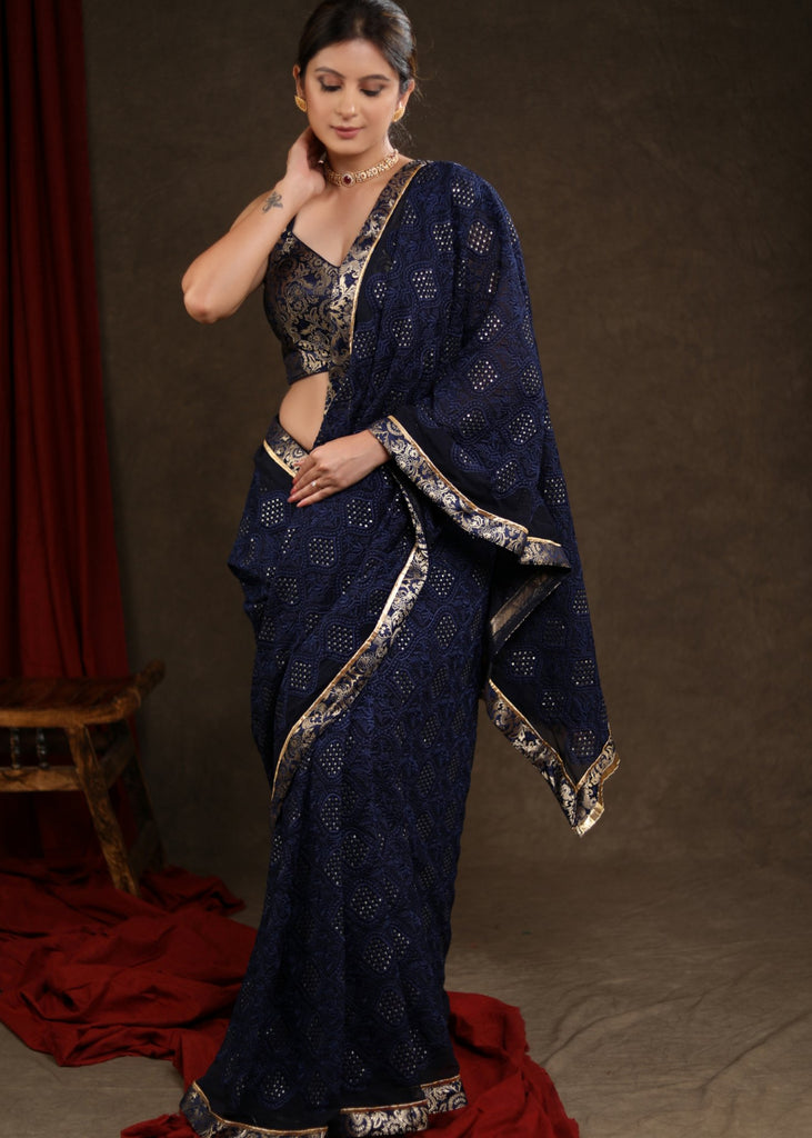Exquisite Midnight Blue Embroidered Saree Highlighted with Banasari Border