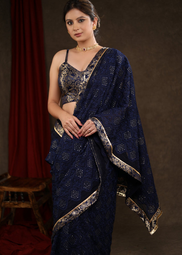Exquisite Midnight Blue Embroidered Saree Highlighted with Banasari Border