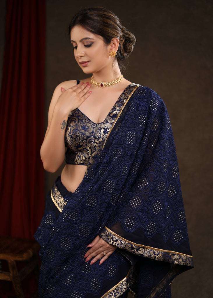 Exquisite Midnight Blue Embroidered Saree Highlighted with Banasari Border