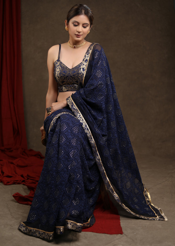 Exquisite Midnight Blue Embroidered Saree Highlighted with Banasari Border