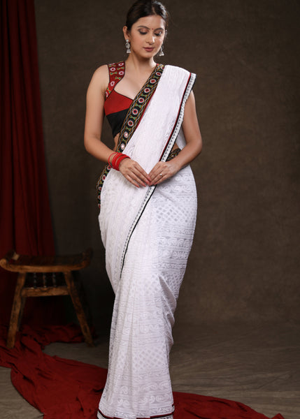Heavy Chikankari Work Georgette White Saree Highlighted with Elegant Mirrorwork Lace
