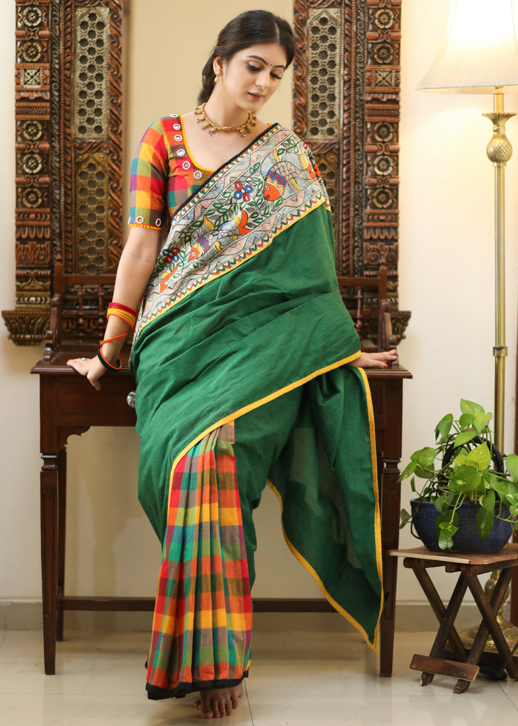 Standout checks Cotton saree adorned with Madhubani hand painted border.