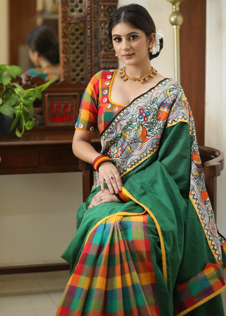 Standout checks Cotton saree adorned with Madhubani hand painted border.