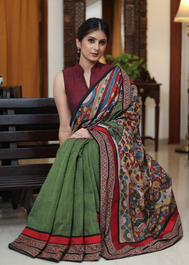 Classy moss green Cotton saree with Kalamkari hand painted Pallu and Ajrakh border