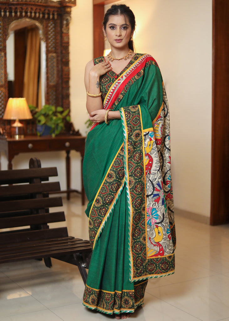 Exclusive green Cotton saree with beautiful Madhubani painted Pallu and Ajrakh border