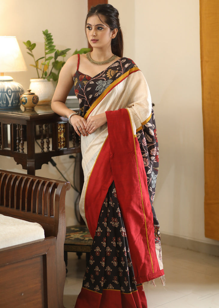 Mesmerizing black printed saree with Kalamkari hand painted Pallu and border