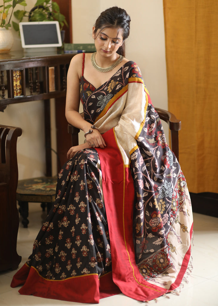 Mesmerizing black printed saree with Kalamkari hand painted Pallu and border