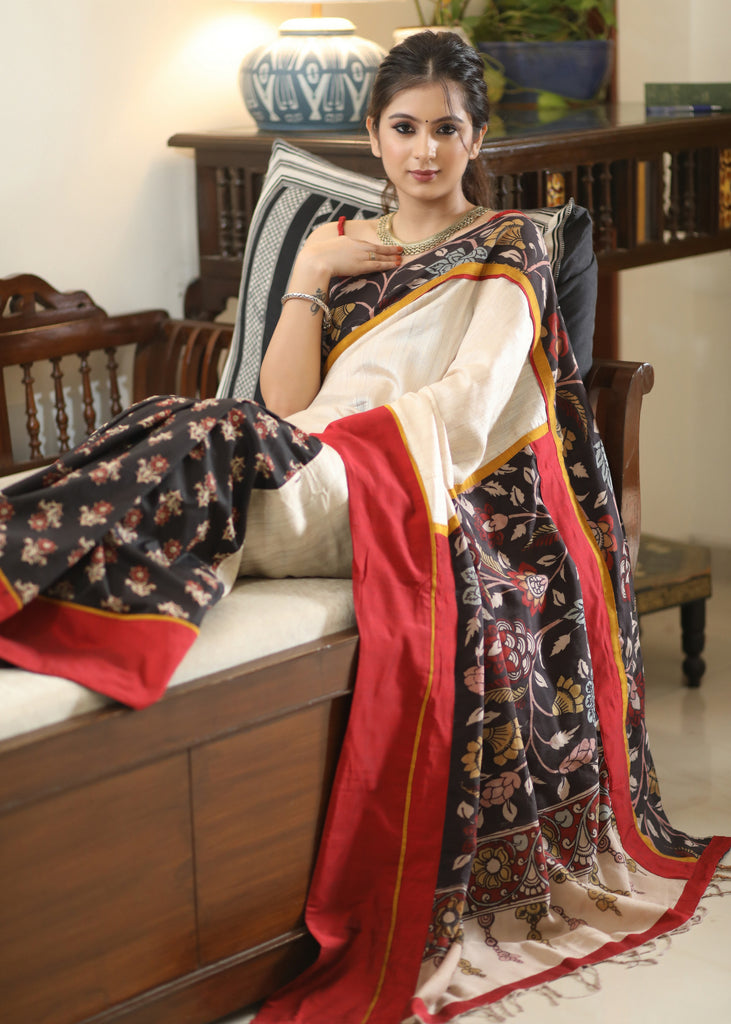 Mesmerizing black printed saree with Kalamkari hand painted Pallu and border