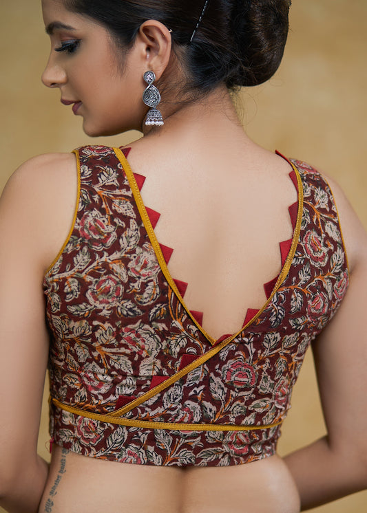 Exclusive Kalamkari Print Sleeveless Blouse with Mustard & Maroon Detailing