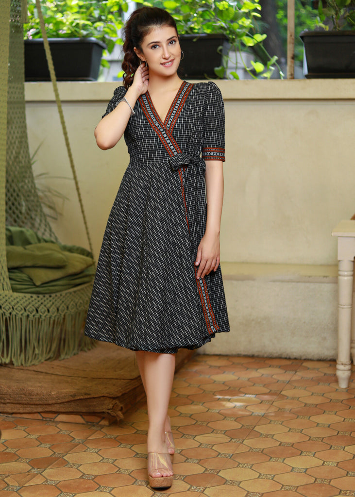 Trendy Black Ikat Overlap Dress Highlighted with Matching Ikat Border