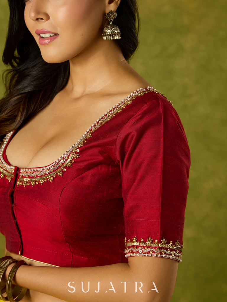 Festive hand embroidered maroon cotton silk blouse.
