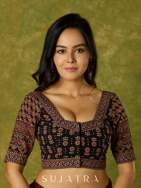 Artfully crafted cotton blouse with rich Ajrakh fabric accents.