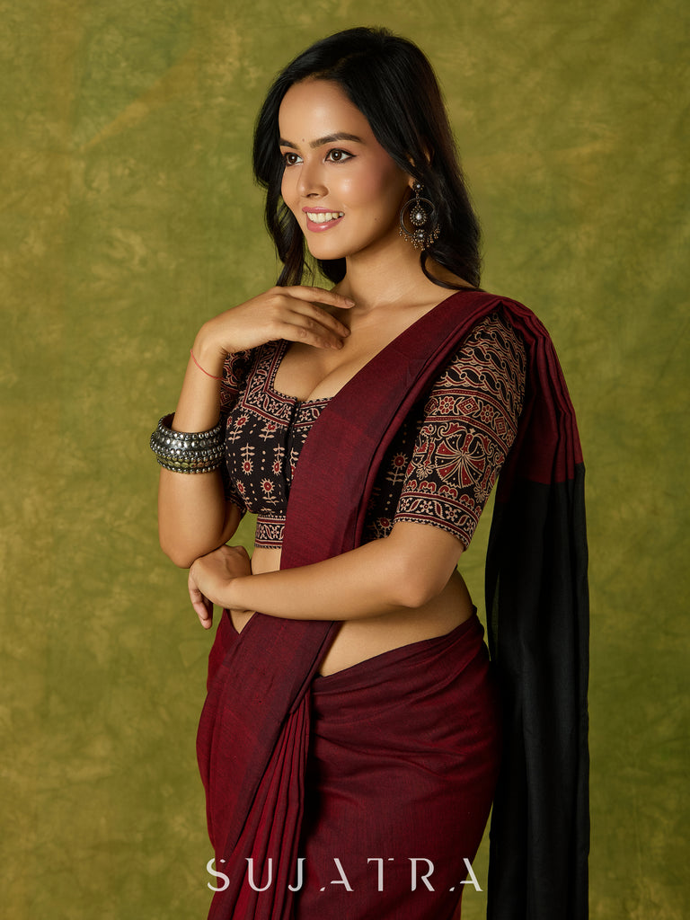 Artfully crafted cotton blouse with rich Ajrakh fabric accents.