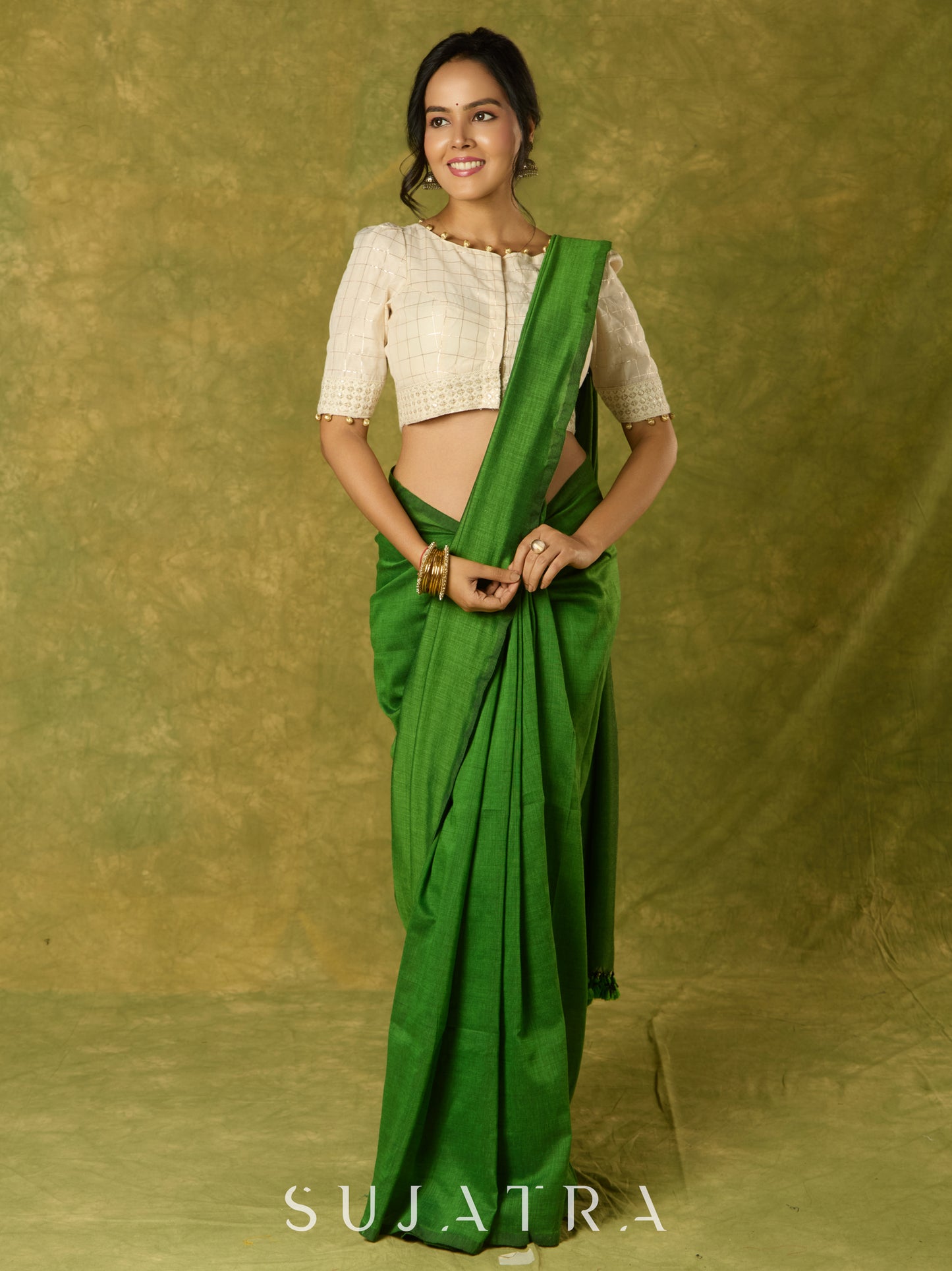 Elegant off-white chanderi blouse beautifully highlighted with delicate lace