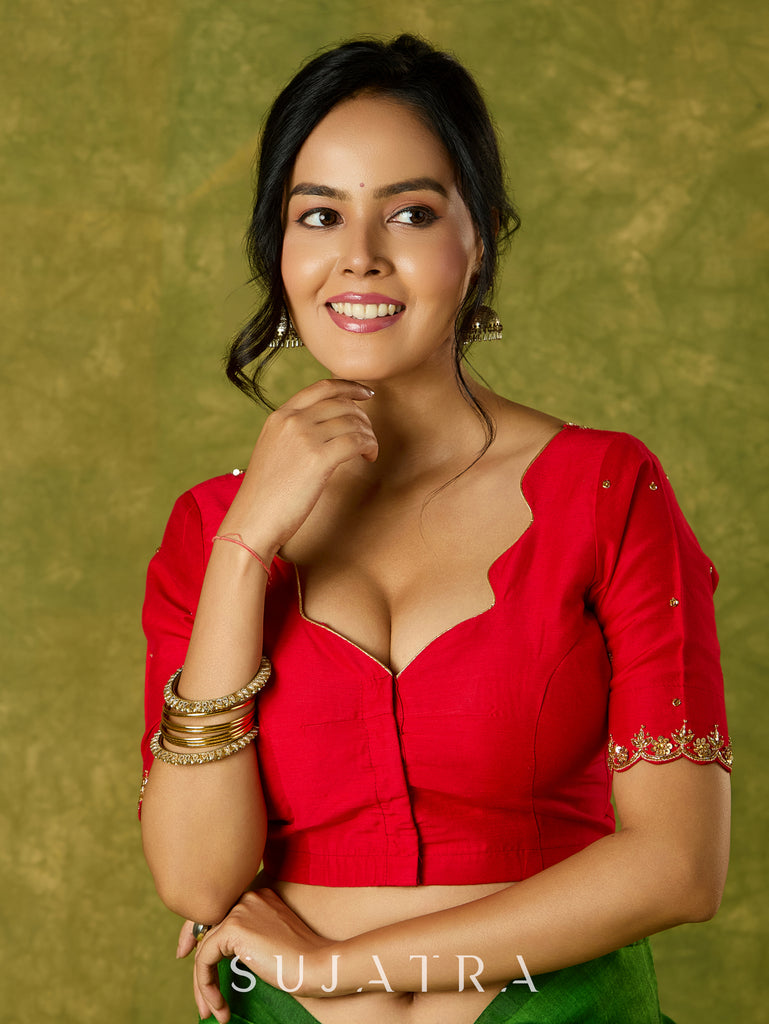 Festive hand embroidered red cotton silk blouse with elegant scallop detailing.