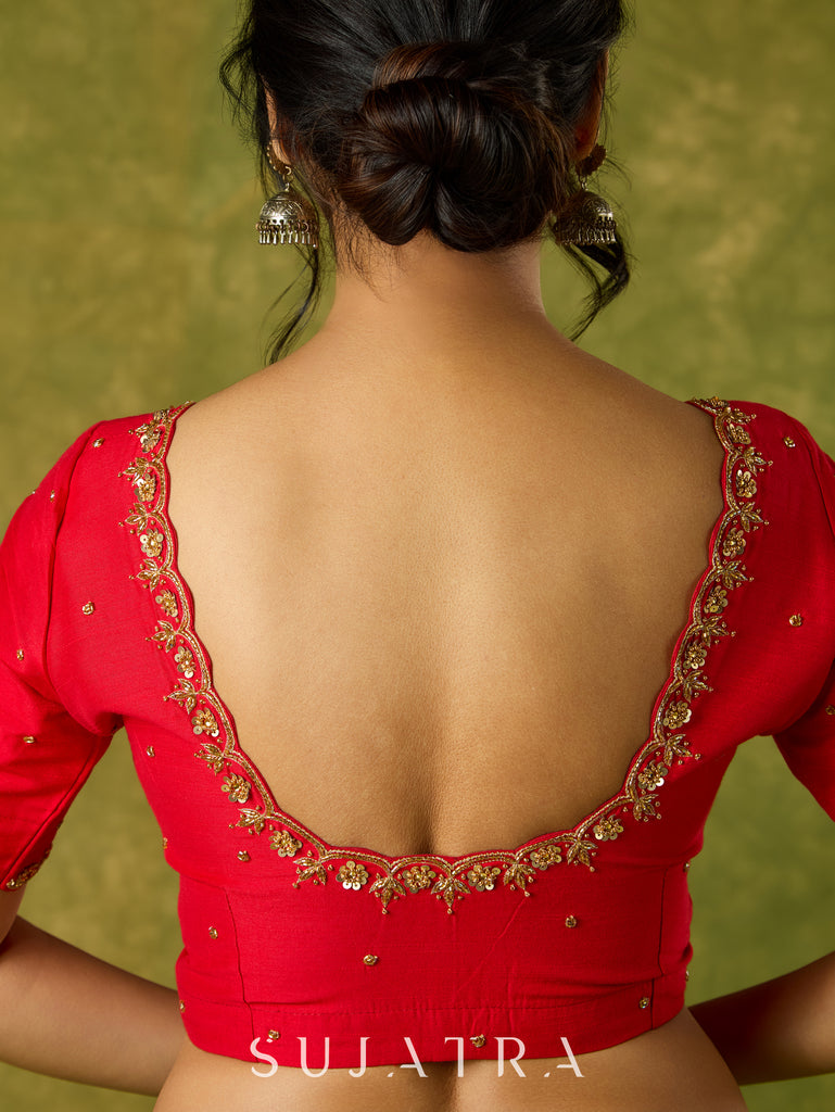 Festive hand embroidered red cotton silk blouse with elegant scallop detailing.