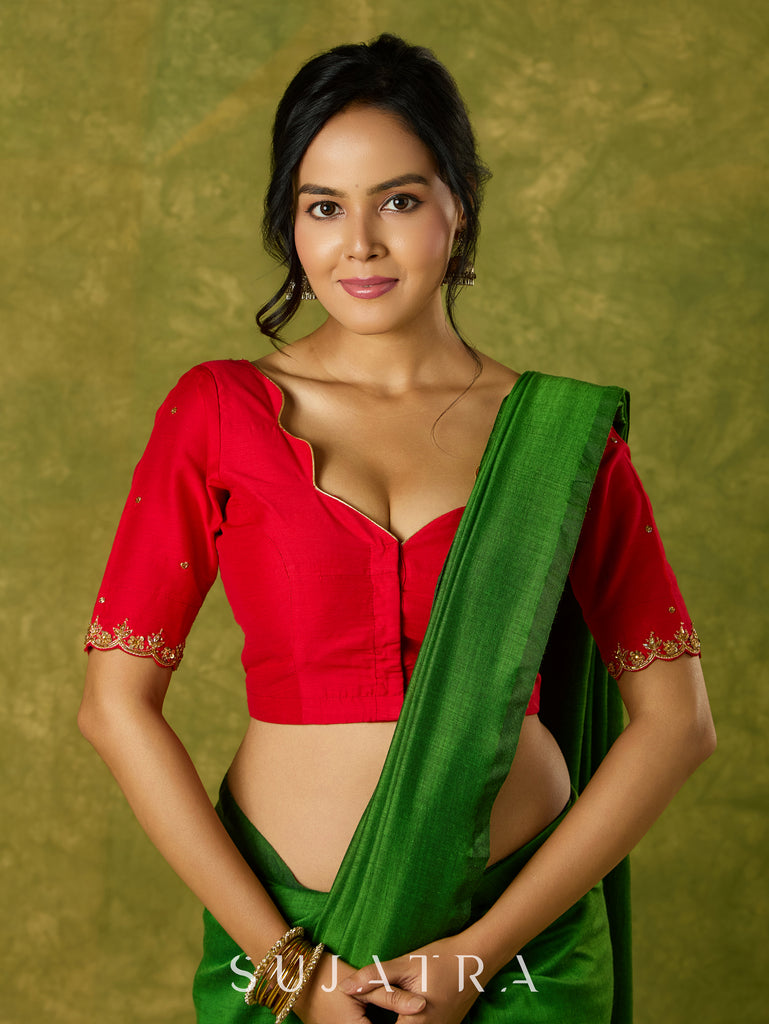 Festive hand embroidered red cotton silk blouse with elegant scallop detailing.