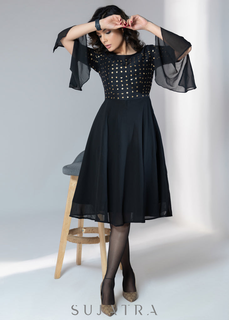 Evening wear Black georgette dress with gold sequence work