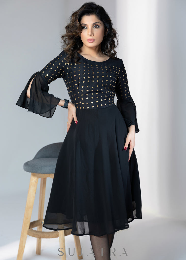 Evening wear Black georgette dress with gold sequence work
