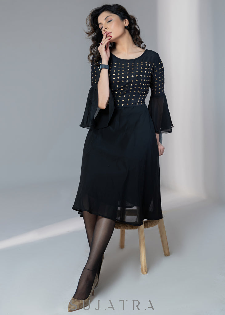 Evening wear Black georgette dress with gold sequence work