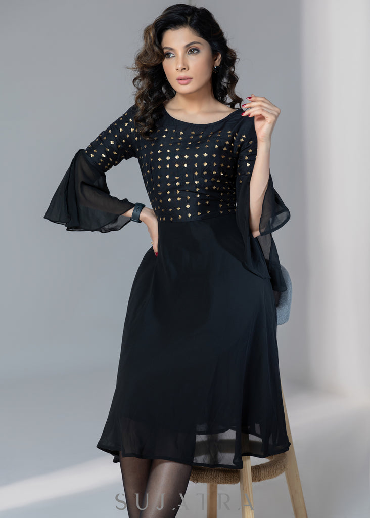 Evening wear Black georgette dress with gold sequence work