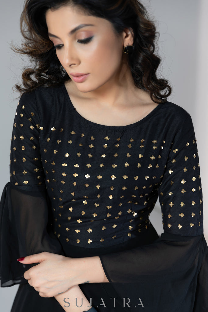 Evening wear Black georgette dress with gold sequence work