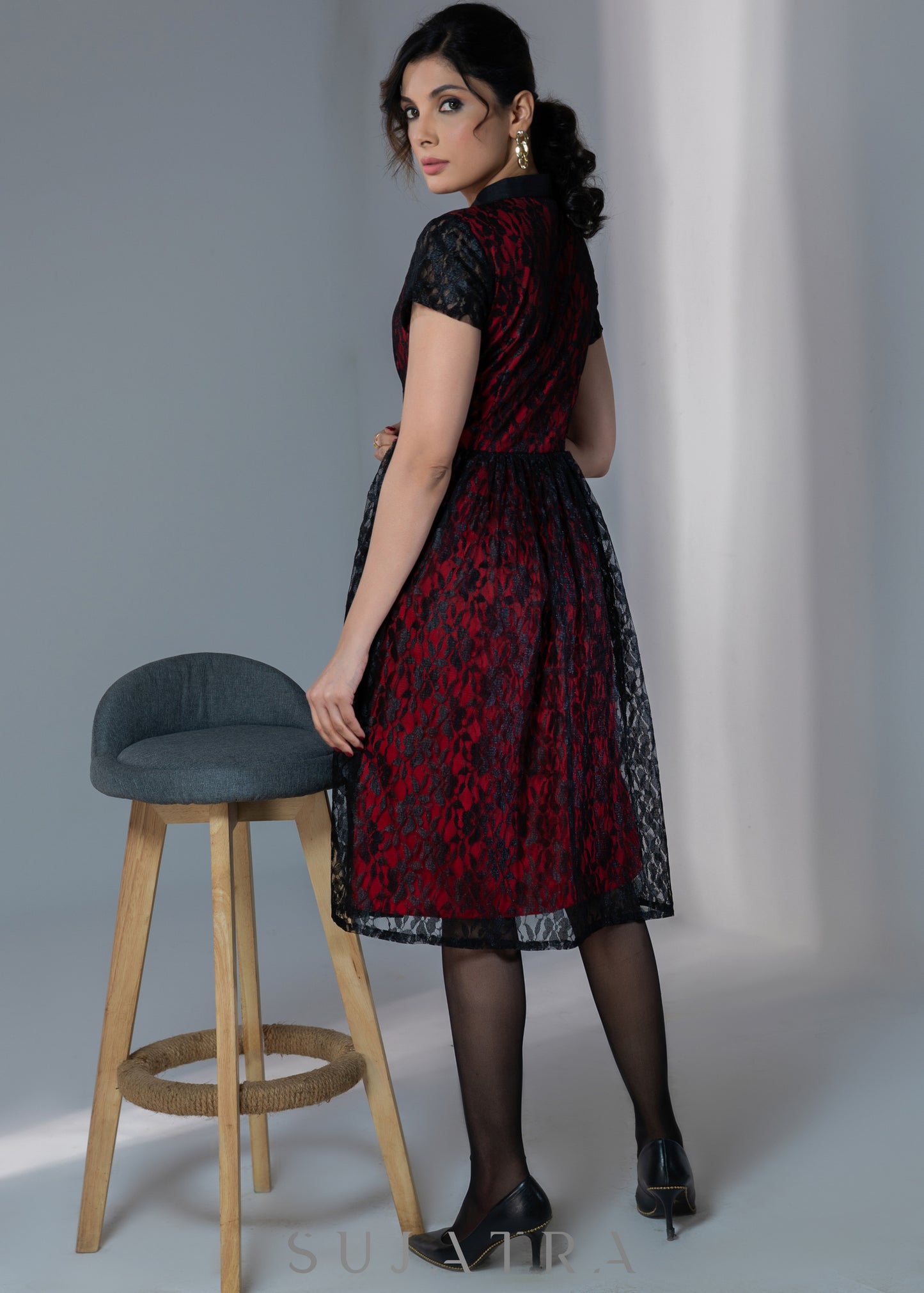 Black lace dress with red lining effect