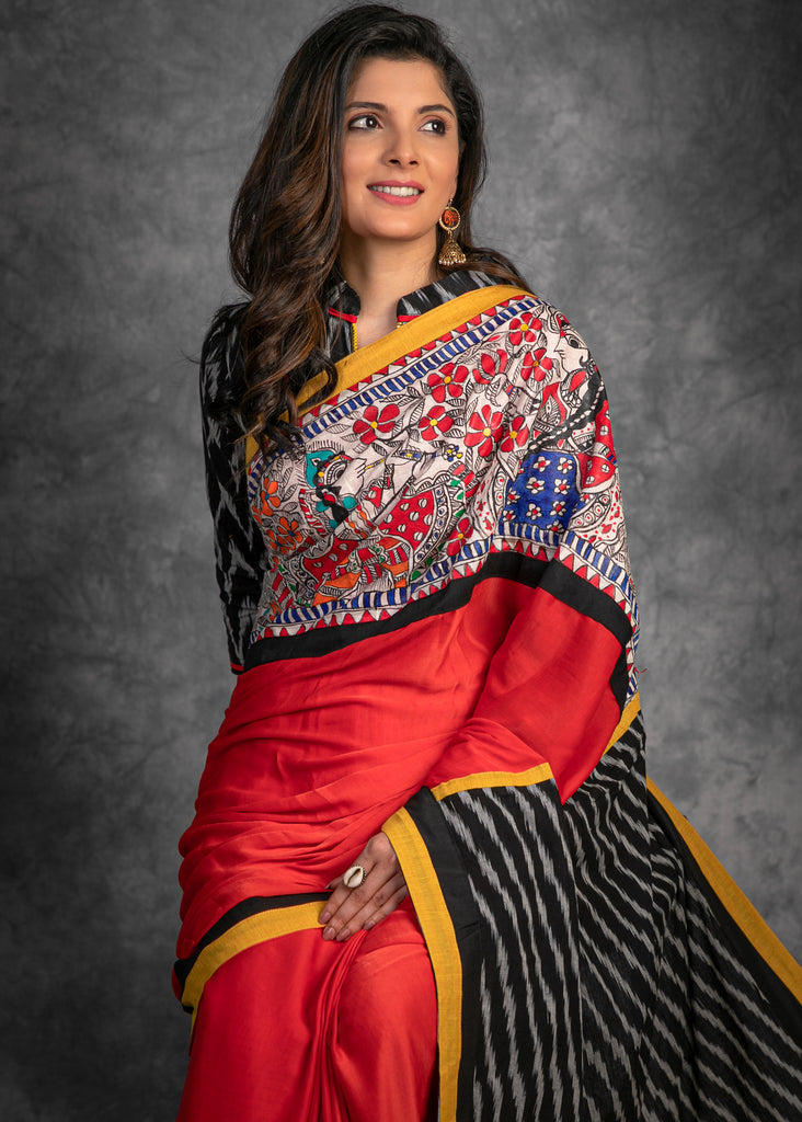 Red crepe satin saree with hand painted madhubani patch & ikkat pallu