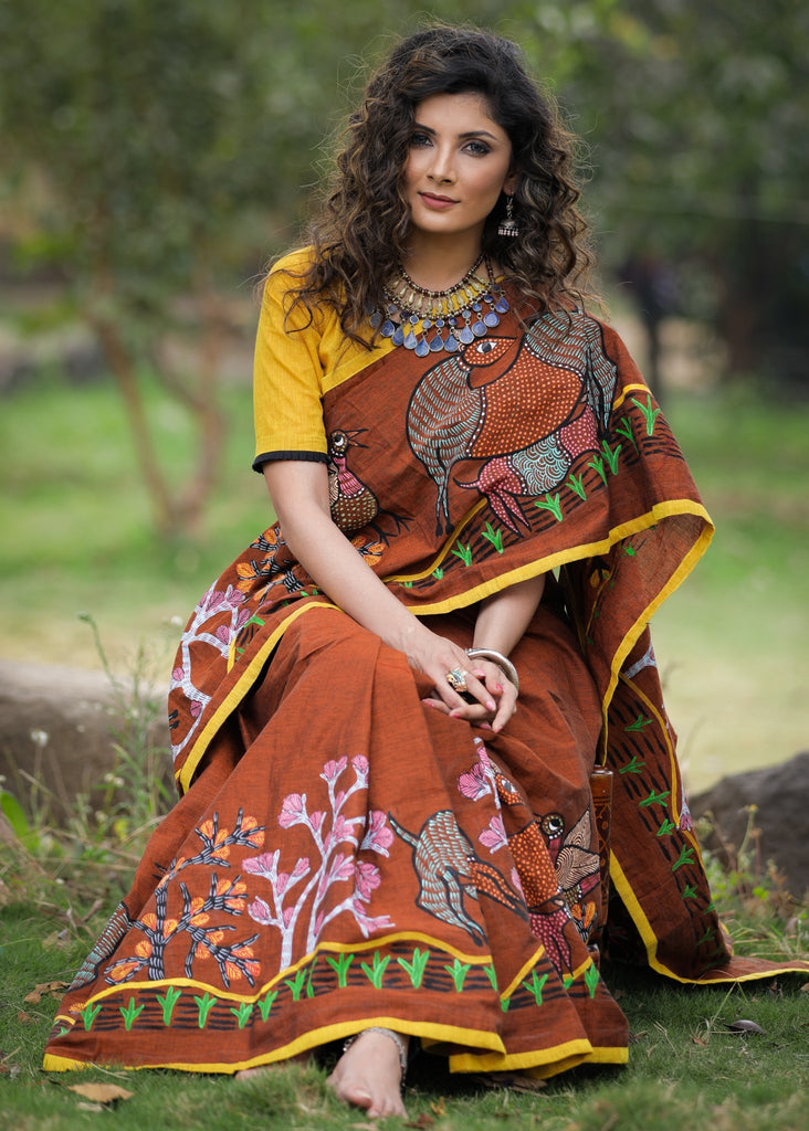 Brown handloom cotton saree with intricate & elaborate gond hand painted border