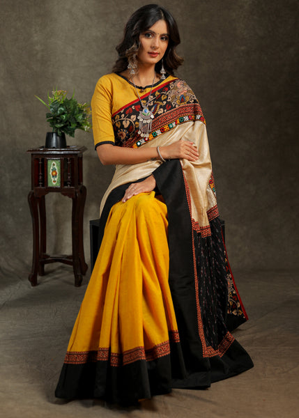 Elegant Cotton mustard and creme saree with black Cotton Ikat Pallu and Kalamkari Border