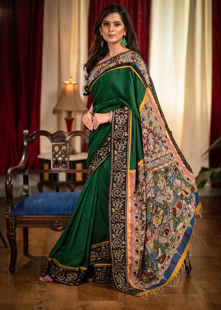 Forest green satin saree with hand painted kalamkari pallu