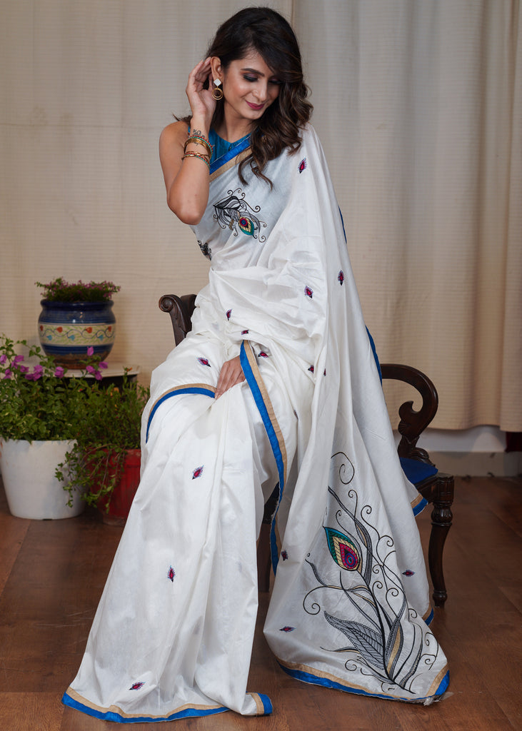 White cotton saree with beautiful peacock feather motif