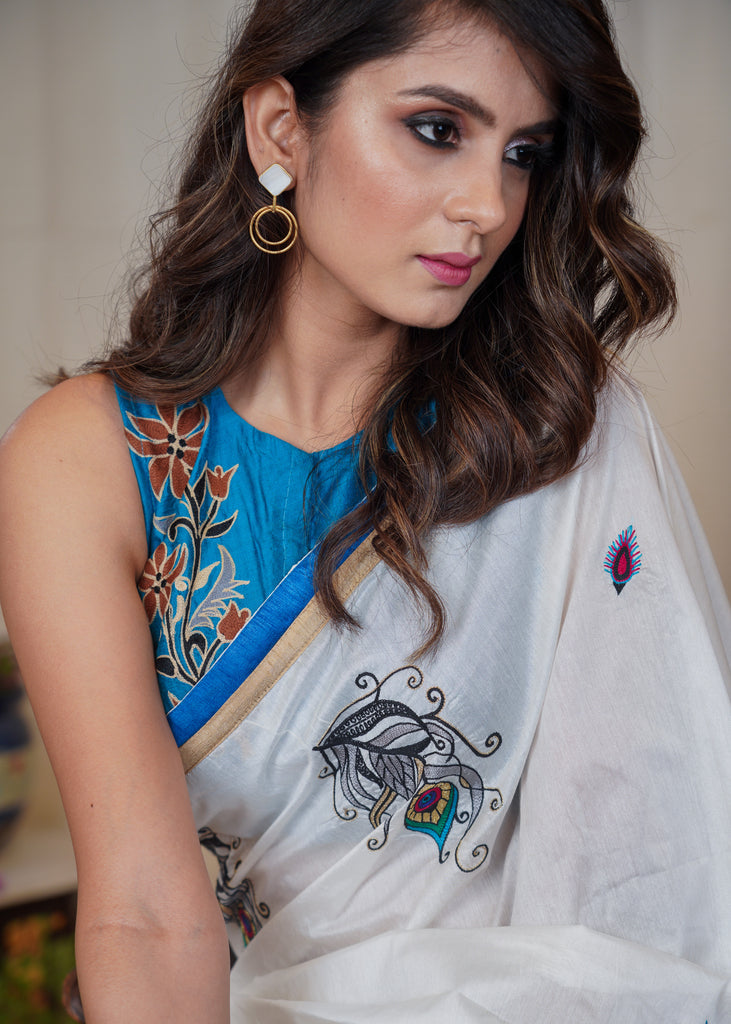 White cotton saree with beautiful peacock feather motif