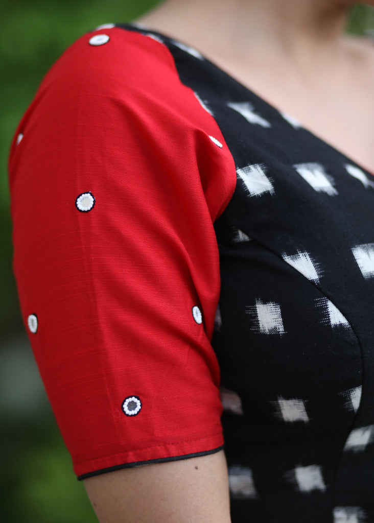 Standout Black Ikat Cotton Blouse with Red Cotton Silk Sleeves and Mirrorwork Detailing