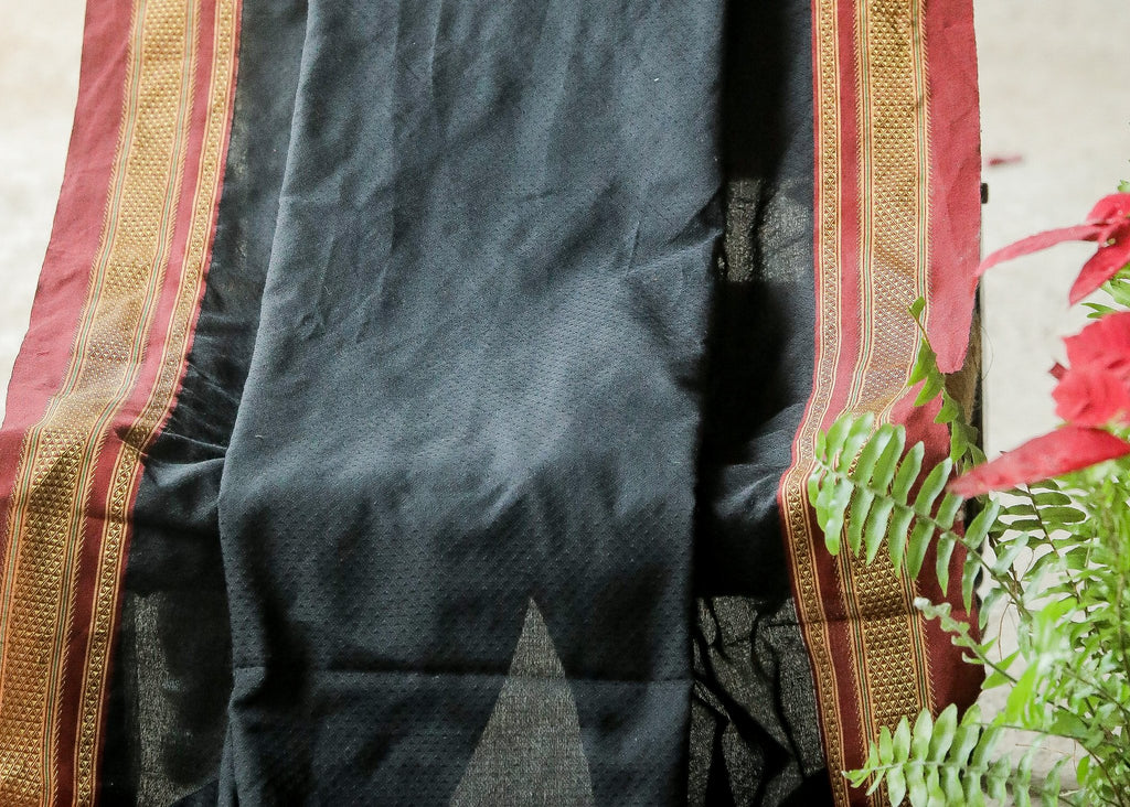 Beautiful Intricate Black Khun Fabric with contrast border and subtle Sheen