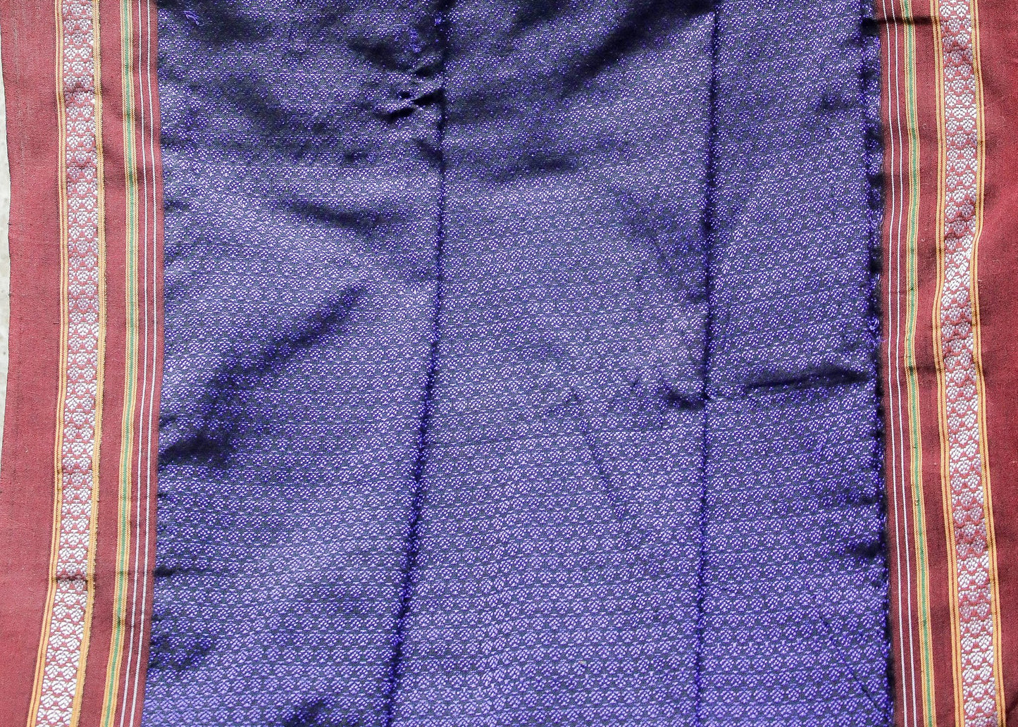 Beautiful Intricate blue Khun Fabric with contrast border and subtle Sheen