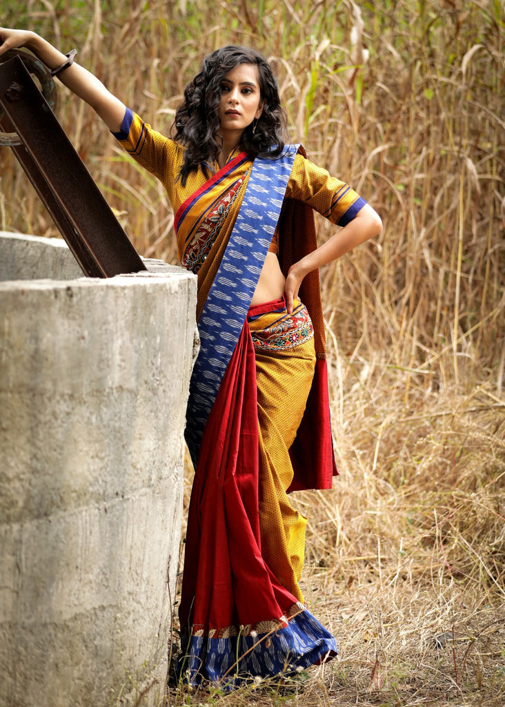 Exclusive golden khun saree with red semi silk pleats with kutch mirror work & ikat border