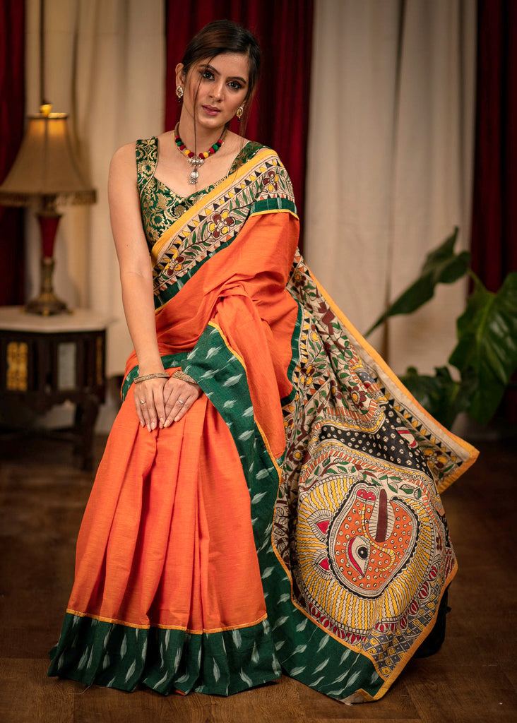 Orange handloom cotton saree with hand painted madhubani pallu and ikat border