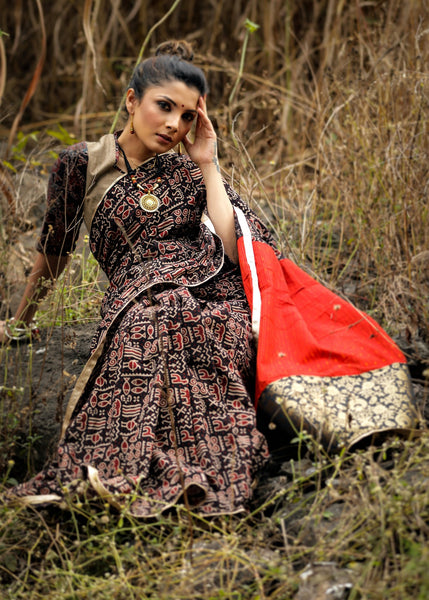 Exclusive block printed ajrakh saree with orange organic cotton pallu & benarasi patch