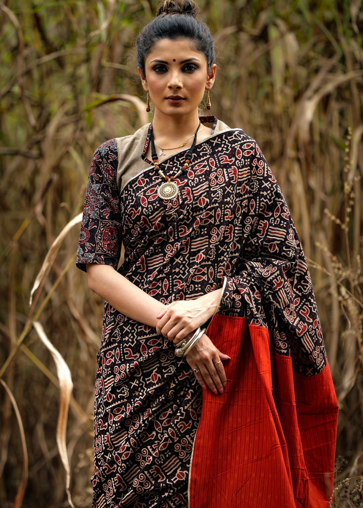 Exclusive block printed ajrakh saree with orange organic cotton pallu & benarasi patch