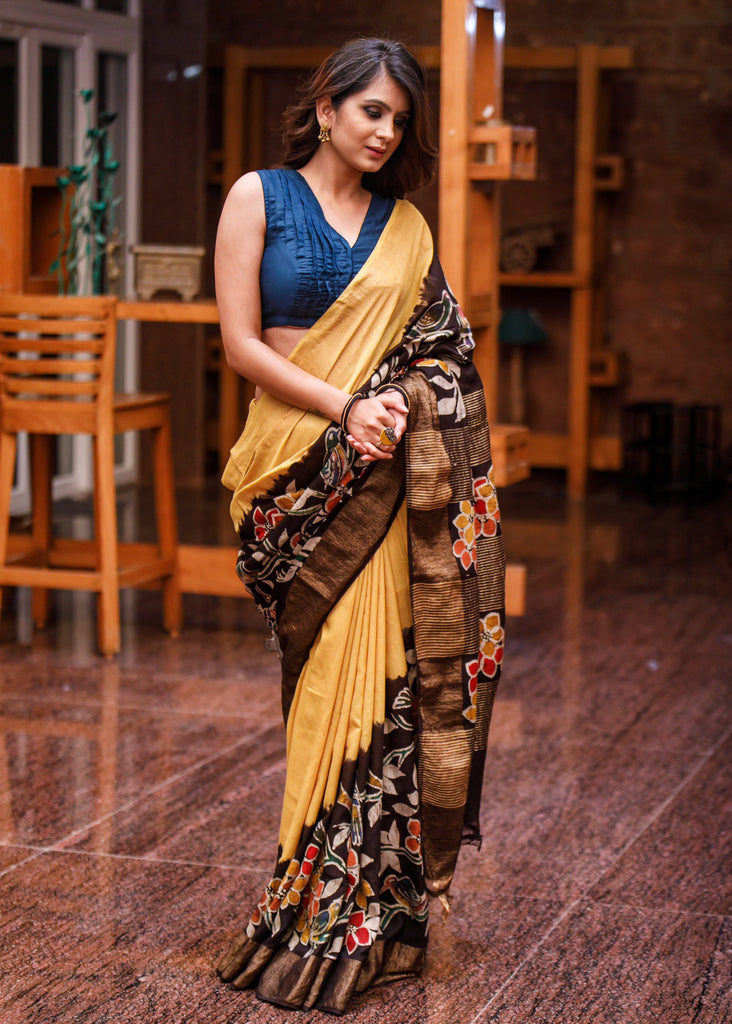 Exclusive yellow hand batik on matka silk mix saree