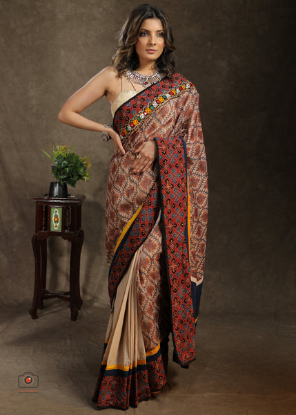 Exclusive beige Cotton saree with Ajrakh, mirror work border and Chanderi printed Pallu