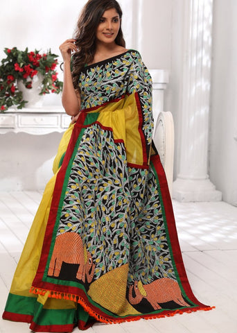 Yellow chanderi saree with hand painted gond tribal art pallu & front