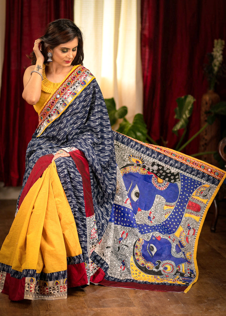 Blue ikaat designer saree with hand painted Madhubani pallu & Kutch mirror work