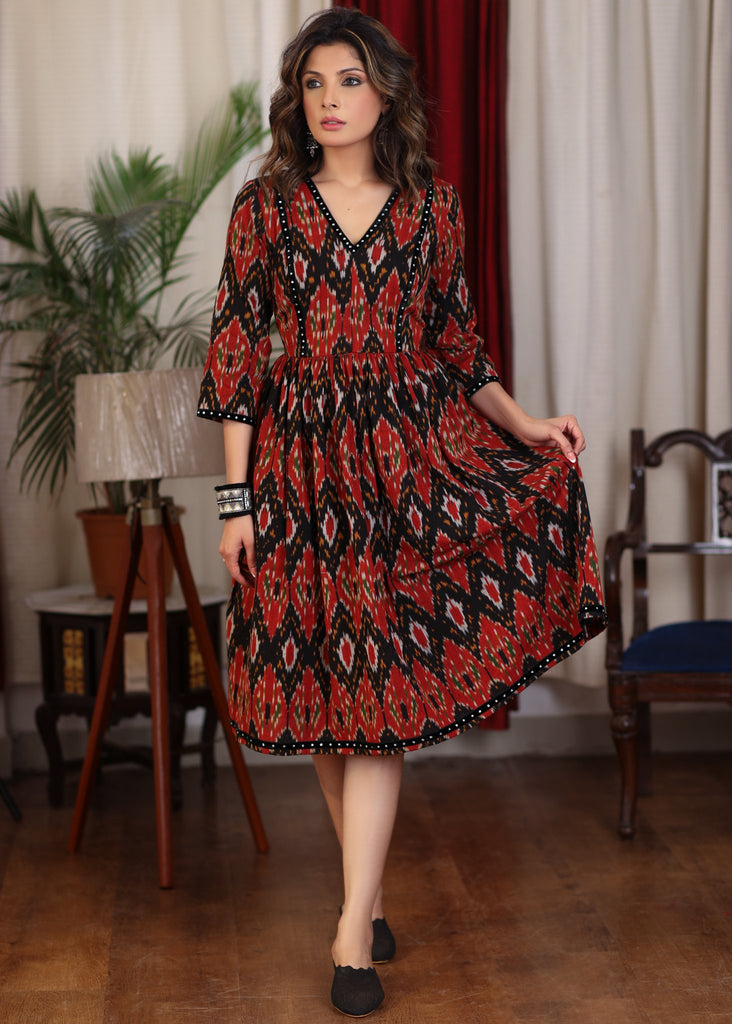 Black multicolor ikat gathered dress highlighted with velvet stone lace