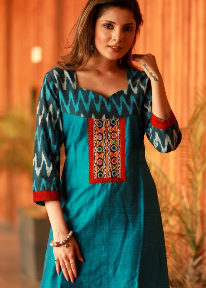 Firozi A-line cotton silk and Ikat combination kurta with Hand made Kutch mirror embroidery