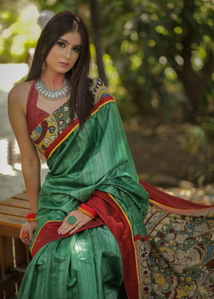 Green pure raw silk saree with hand painted kalamkari pallu & border